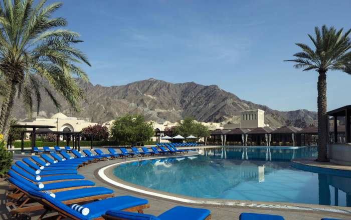 Grab a Sun Lounger Around the Cooling Pool