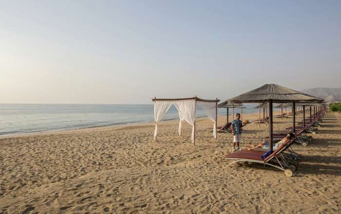 Take the Chance to Kick Back on Al Aqah Beach
