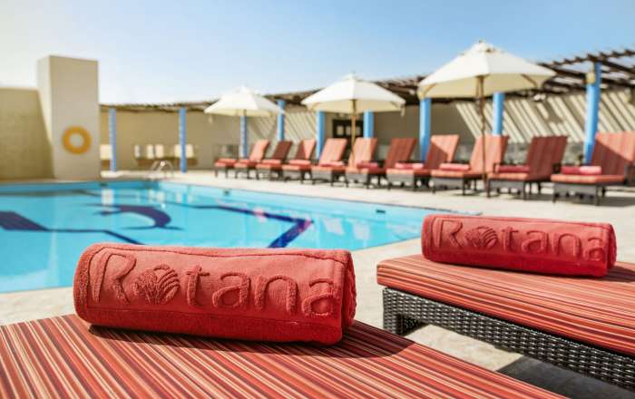 Relax Poolside at Jumeira Rotana