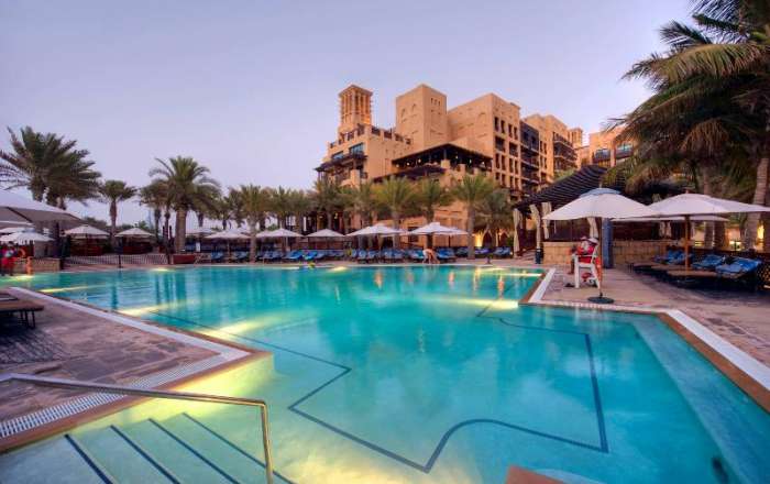 Chill with a Drink of your Choice by the Pool