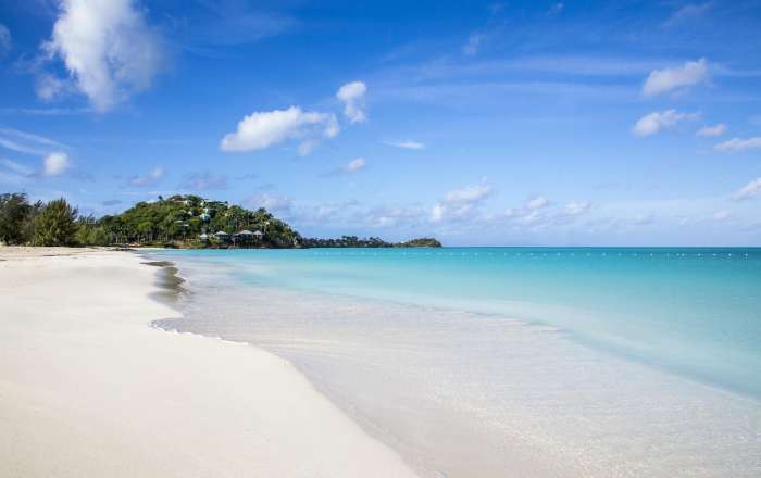 Set Along a Pristine Stretch of White-Sand Beach