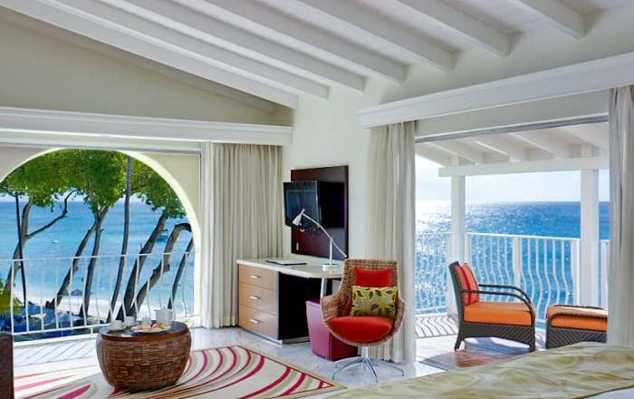 Ocean View Junior Suite with sweeping views of the Caribbean Sea