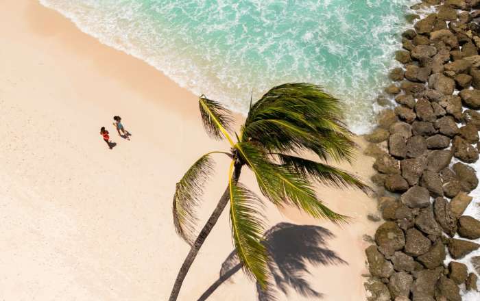 Spend your days on the 1,500-foot stretch of white-sand beach