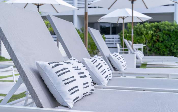 Relax on a lounger by the pool