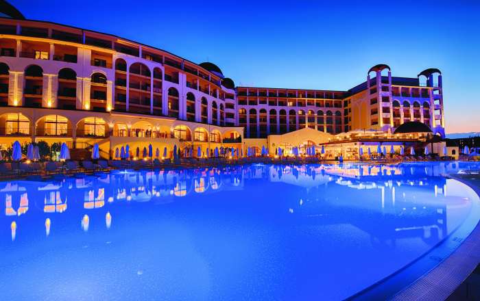 Beautiful Resort & Pool Lit Up in the Evening