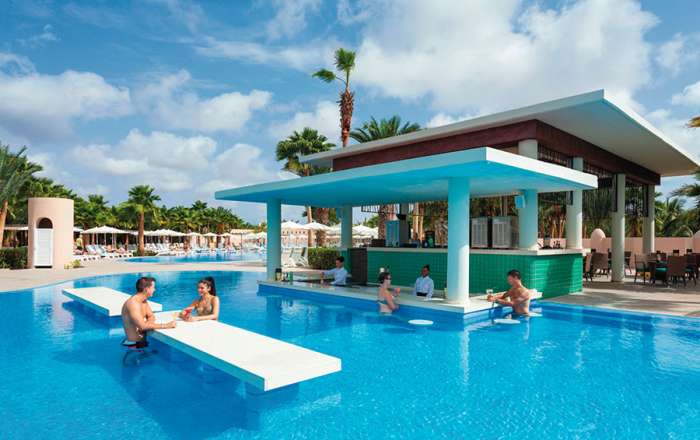 Spend lazy days at the swim-up pool bar