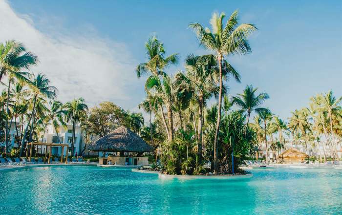 Lounge Around One of the Expansive Pools