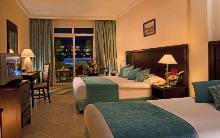 Family room with terrace and pool views