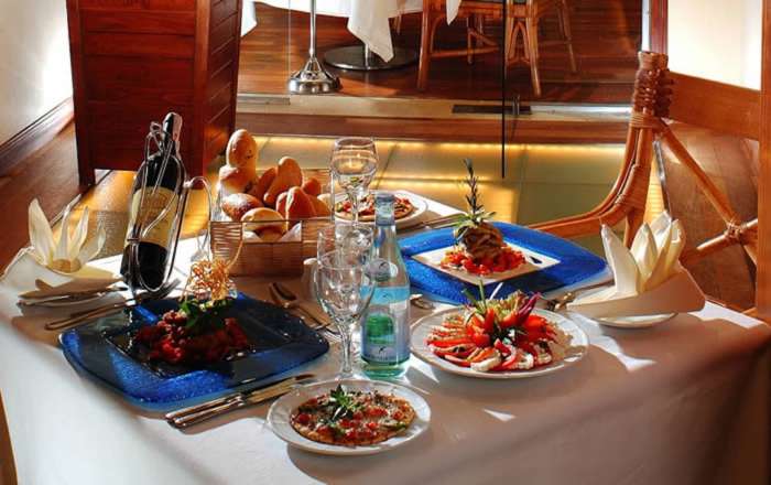 Table with food and wine at restaurant