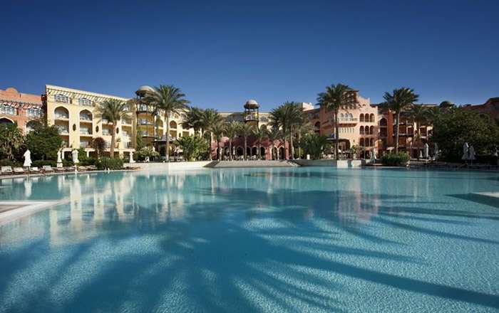 Large pool with view towards hotel accommodations