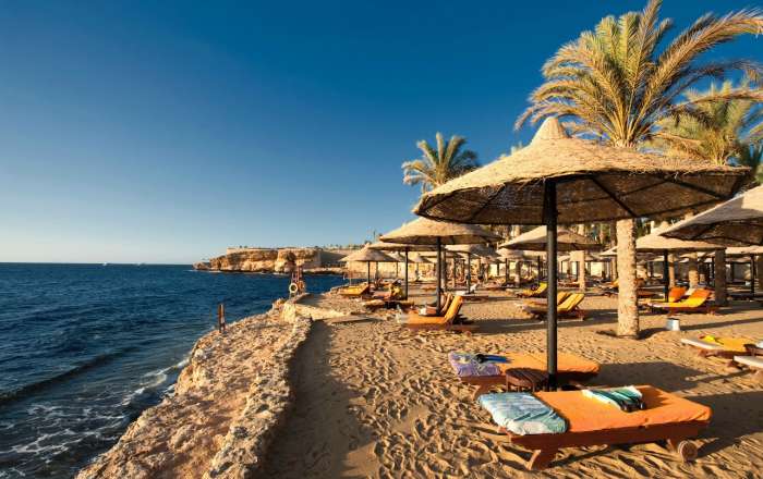 Private beach area with sun loungers