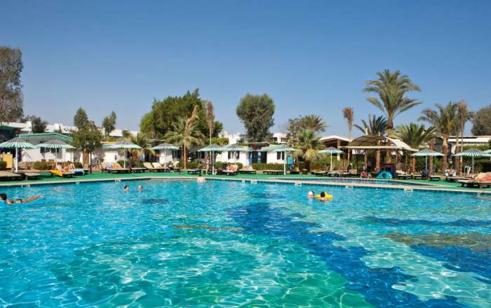 Large pool area with sun loungers