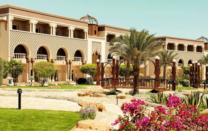 View towards hotel accommodations & gardens