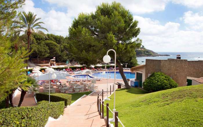 Wander the manicured grounds down to the pool