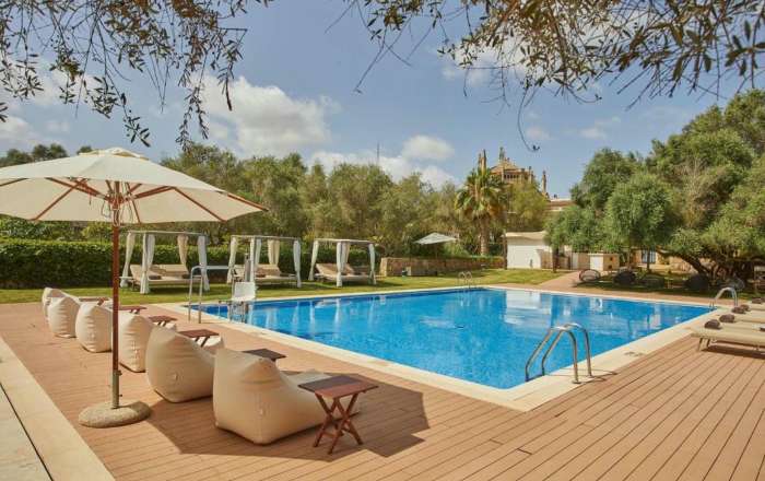 Get busy with a book while you chill around the pool