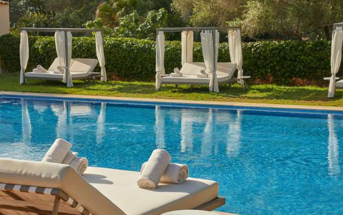 Let the sun-caress your skin as you relax on a cabana  