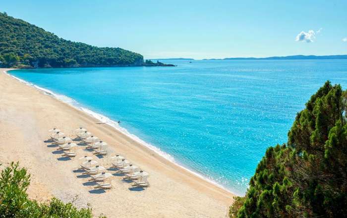 Grab a Perch Overlooking Karavostasi Beach