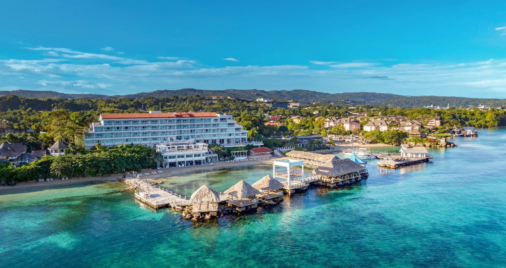 Sandals Ochi Beach Resort with Return Business Class Flights