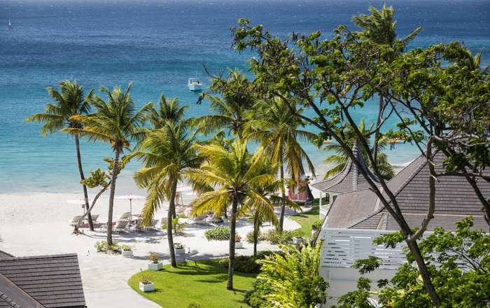 Situated Along a Stretch of White Sand Beach