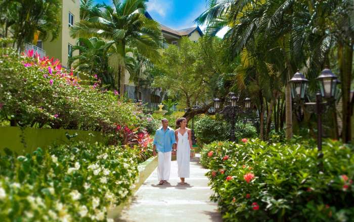 Couple Walking Through the Gardens