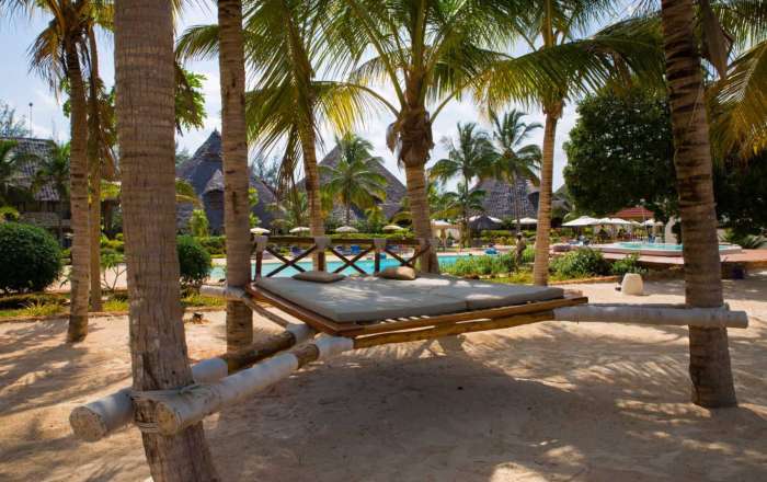 Relax under palm-fringed shores