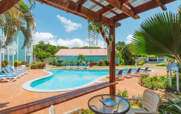 Relax Poolside at Bay Gardens Marina Haven