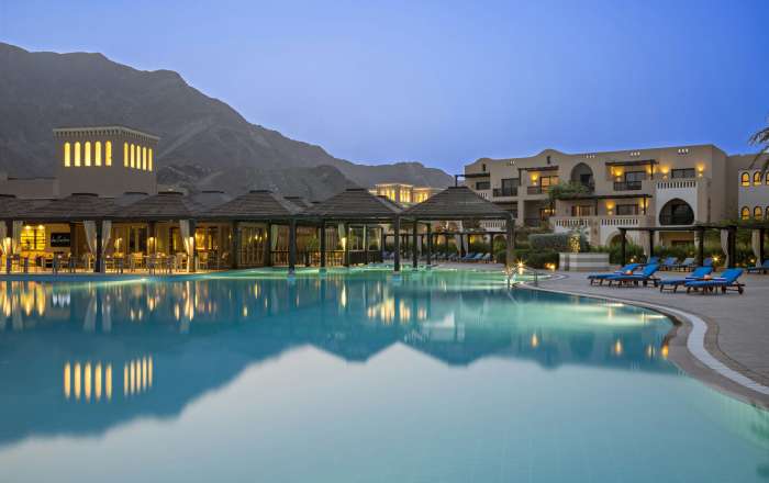 The Pool Looks Gorgeous Lit Up at Night